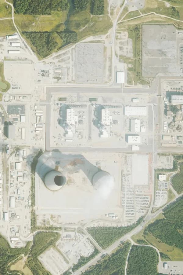 The same site in 2023, with the cooling towers and plant complete